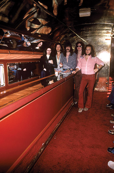 UNSPECIFIED - MARCH 01: Photo of David COVERDALE and Ritchie BLACKMORE and Jon LORD and Ian PAICE and Glenn HUGHES and DEEP PURPLE; Ritchie Blackmore, Glenn Hughes, Jon Lord, David Coverdale, Ian Paice - posed, group shot, standing at bar on board their Starship plane, (Photo by Fin Costello/Redferns)